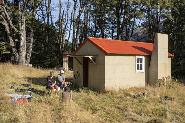 Trampers at Begley Hut Rainbow Conservation Area
